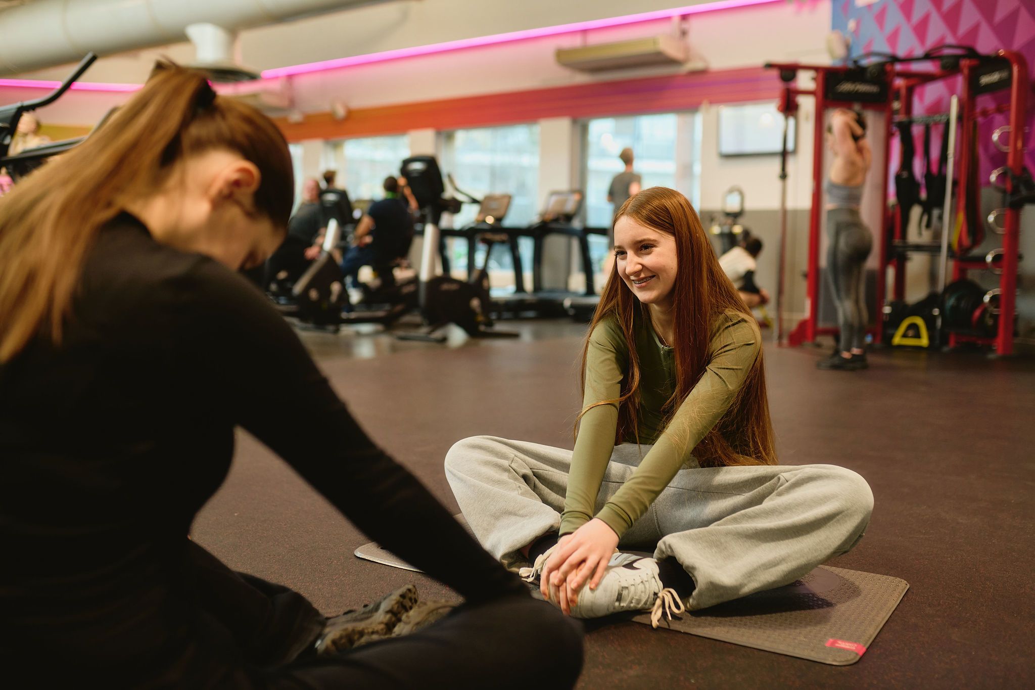 Girl stretching smiling